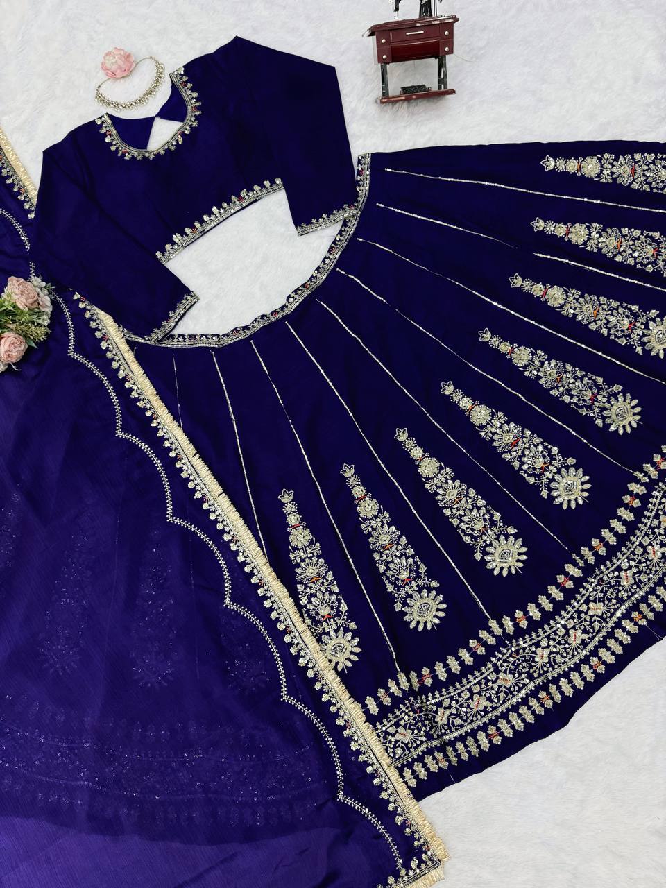 Radiant Rani Pink Silk Lehenga Choli Adorned with Opulent Heritage Floral Motifs and Intricate Zari Borders